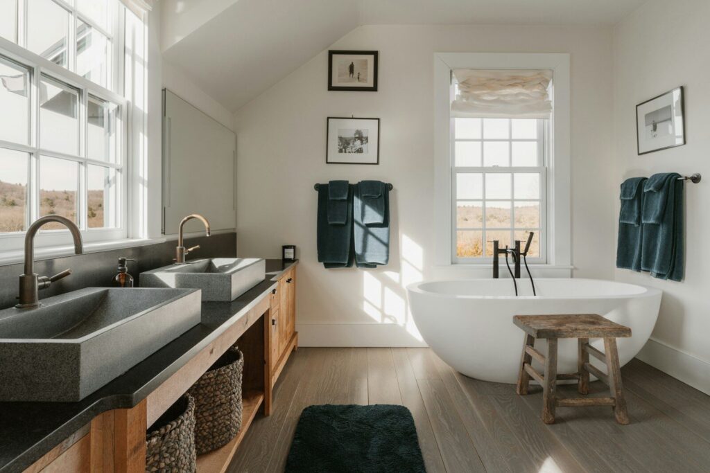 Modern bathroom with double sinks and freestanding bathtub